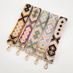 Detail of 5cm diamond jacquard wide shoulder straps with gold metal hooks and colorful patterns