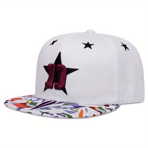 Close-up of white snapback hat with red number 11 embroidery and colorful printed brim