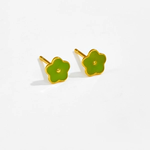 Close-up of S925 silver flower stud earrings with green enamel and gold finish
