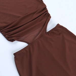 Detailed view of dark brown mesh stitching and hollow-out waist pleats on this bodycon dress