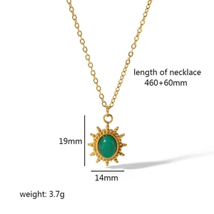 Detail of 18k gold plated sunburst pendant with green stone and size specifications