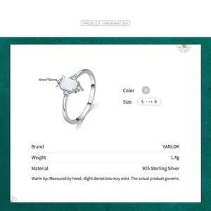 Elegant 925 sterling silver ring with rectangular opal and zircon accents on white background