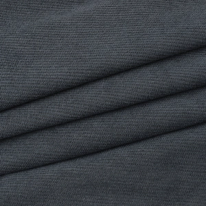 Detailed macro shot of dark grey knit fabric texture with soft diagonal folds