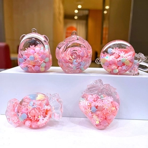 Pink rose and strawberry quicksand acrylic keychain set with cute bear and candy shapes