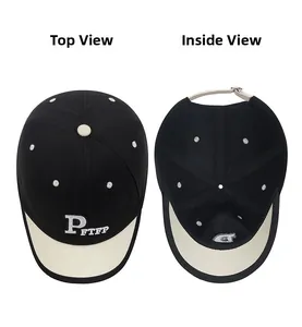 Detail view of two-tone baseball cap featuring letter embroidery and interior structure
