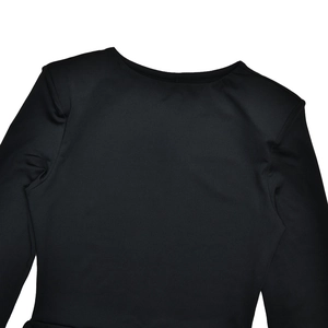 Detail of the crew neck and elastic knit fabric on this slim black long-sleeve dress