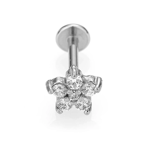 Macro shot of silver flower piercing stud with clear cubic zirconia stones and flat base