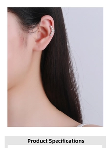 Close-up of elegant 925 sterling silver ear cuff with five pearls on a female model's ear