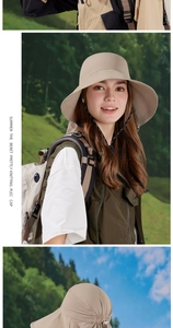 Detail of beige wide brim sun hat with windproof drawstring for outdoor hiking and camping