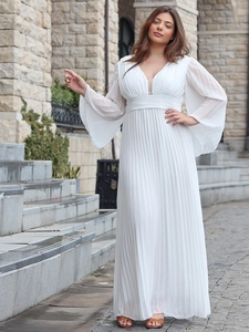 Elegant white maxi dress with deep V-neck, pleated fabric and flared sleeves for women