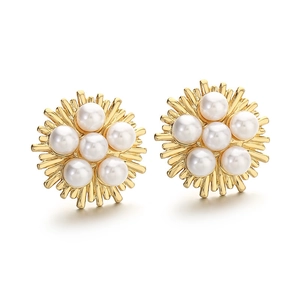 Elegant gold flower stud earrings with white pearl cluster in a luxury hollow petal design