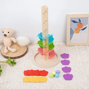 Handcrafted wooden rainbow music leaf tree toy set with colorful petals and rolling balls