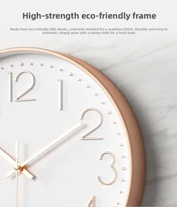 Detailed close-up of rose gold finish frame and 3D numerals on 30CM modern wall clock
