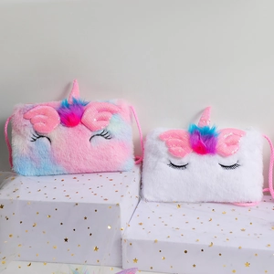 Plush unicorn crossbody bags featuring rainbow faux fur, pink wings, and sequin horn detail