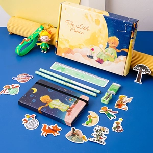 Flat lay detail of The Little Prince stationery gift set with notebook and accessories