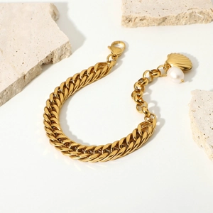 Gold plated Cuban chain bracelet with freshwater pearl and shell charms on stone tiles