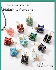 Close-up of Merkabah crystal pendants with handcrafted gold wire wrapping in 12 colors