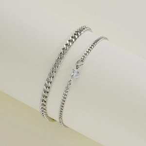 Double-layered silver Cuban chain bracelet set with a heart cubic zirconia pendant