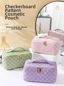 Three checkered pillow cosmetic bags in green, pink, and purple with dual zippers