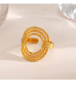 Detail showing the layered oval design and textured finish of this golden open ring
