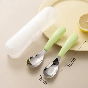 316L stainless steel baby spoon set with green handles and a transparent storage box