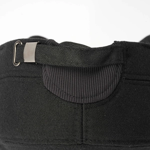 Detailed close-up of men's winter cap with adjustable metal buckle and warm fabric texture