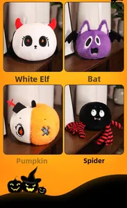 Detail view of plush Halloween toys including ghost, bat, pumpkin, and spider dolls