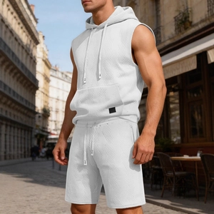 Men's white sleeveless hoodie and shorts set with unique textured knit fabric