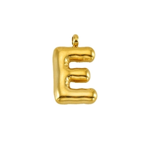 Macro view of gold plated balloon-style letter E pendant with a smooth metallic finish
