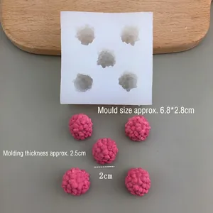 Macro view of raspberry silicone mold with 2cm fruit diameter measurements for DIY crafts