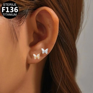 F136 Titanium butterfly stud earrings in gold and silver finish with sparkling zircons