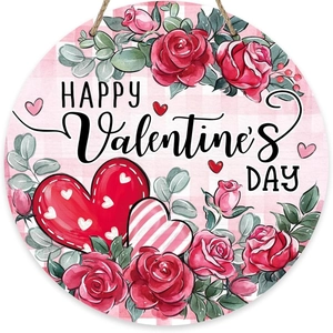 Detail view of round wooden Valentine's Day wreath with pink plaid and red roses pattern