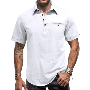Close-up of white cotton linen shirt showing breast pocket and wooden buttons