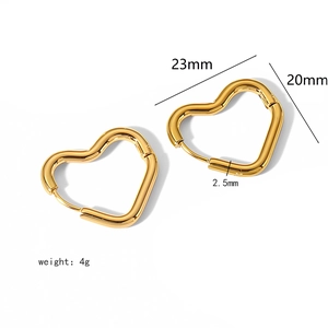 Detailed view of hollow heart earrings with 23mm by 20mm dimensions and 4g weight