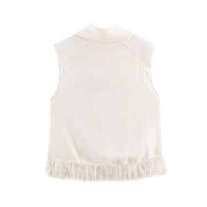 Women's elegant sleeveless light beige top featuring feathered fringe hem and padded shoulders