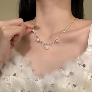 Elegant zircon waterdrop pearl pendant necklace for women shown on a model neck