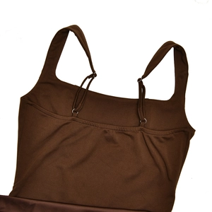 Detail of adjustable shoulder straps with metal rings on a brown bodycon evening dress