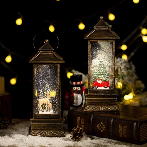 Vintage bronze Christmas water lantern with deer and red truck scenes with swirling glitter