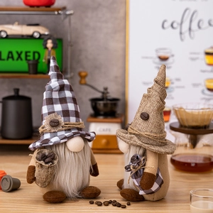 Two handmade coffee gnomes with plaid hats and coffee bean sacks for home decoration
