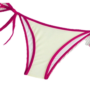 Two-tone bikini bottom in yellow and pink with adjustable side ties and contrast trim