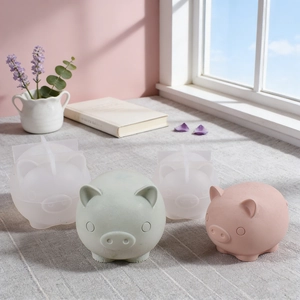 Detail view of 3D pig silicone molds with plaster finished crafts for DIY candle making