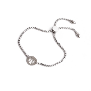Polished stainless steel bolo bracelet featuring a cutout angel charm on white background