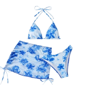 Three-piece women's floral bikini set with halter top, high cut bottoms and sarong