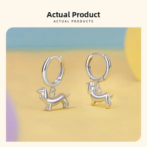 Close-up of S925 sterling silver dachshund charm hoop earring with hallmark engraving