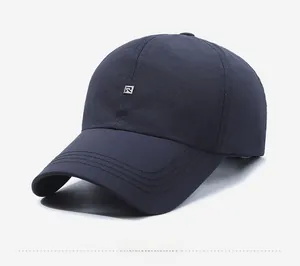 Detailed side view of navy blue quick-dry baseball cap with R SPORTS metal logo