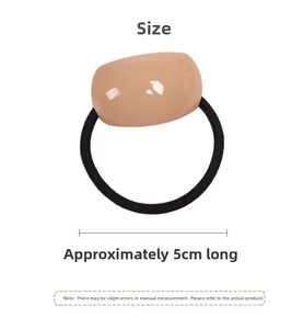 Detail showing the 5cm length measurement of this beige resin bead elastic hair tie