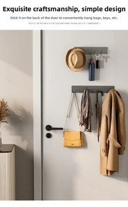 Minimalist wall-mounted hooks in dark grey matte aluminum with four and five hook options