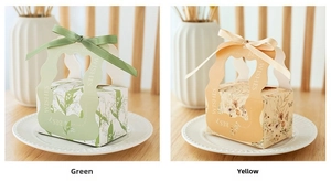 Detail of luxury wedding candy gift boxes with ribbons and hollow out BEST WISHES design