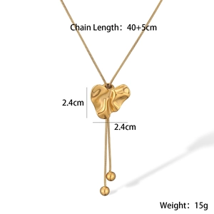 Detail view of 18K gold plated heart pendant necklace with dimensions and chain length