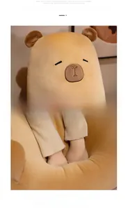 Detail of soft capybara plush pillow showing embroidery and high-rebound fabric